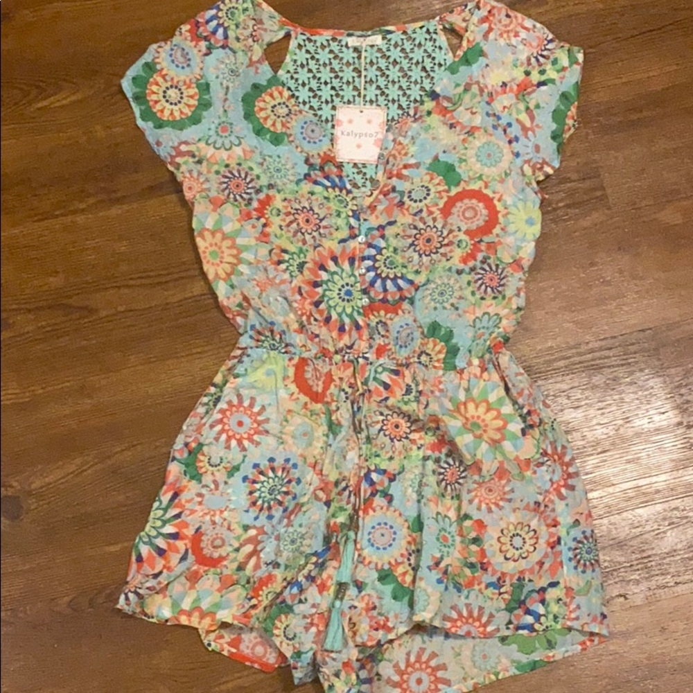 Floral romper with laced back